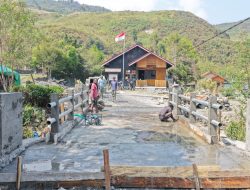 Kodim 1714/Puncak Jaya Jembatan Beton Merah Putih Tahap VII Ke-2 Resmi Digunakan Masyarakat Kampung Kulok Enggame Distrik Pagaleme